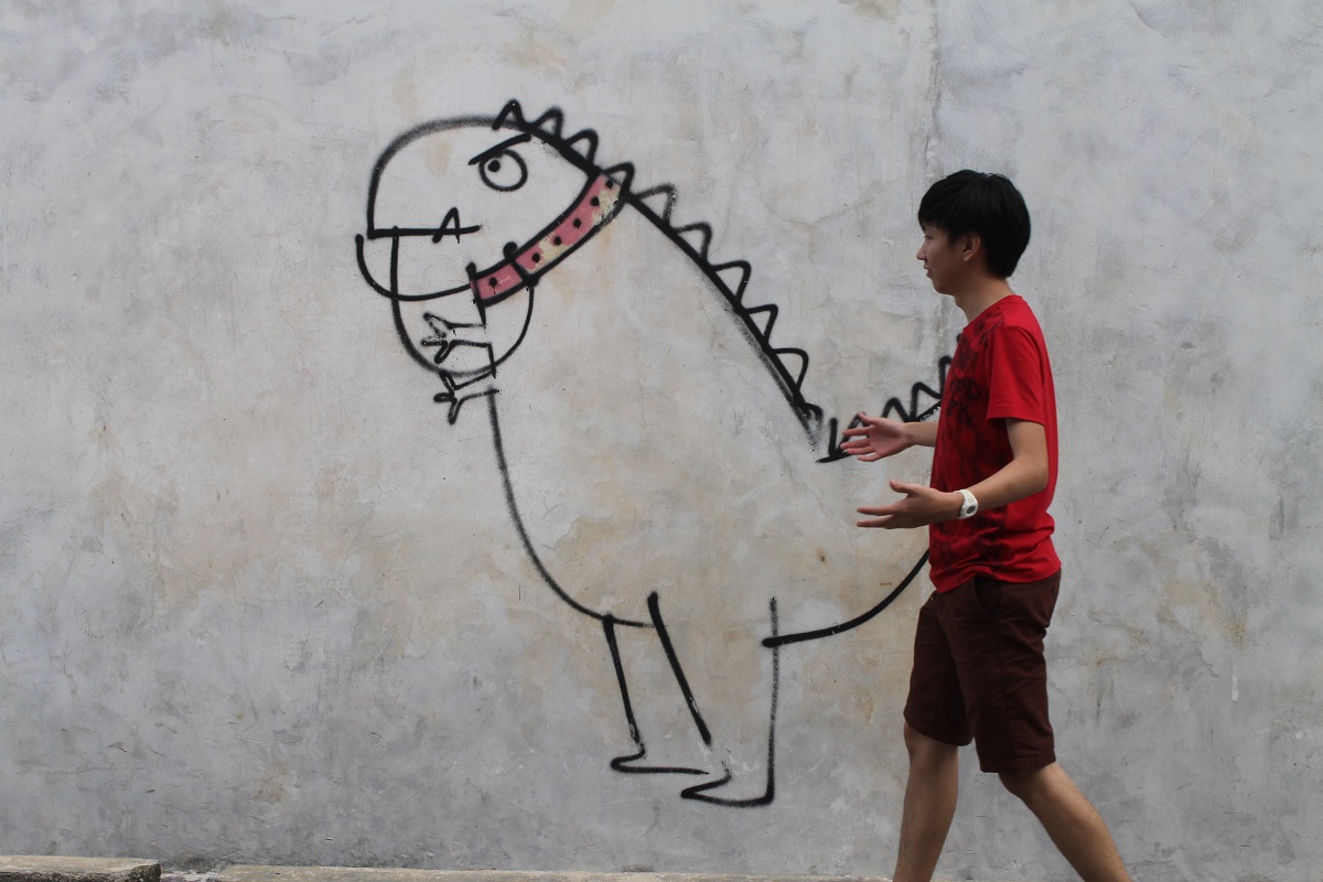 At Penang's art street with a dinosaur